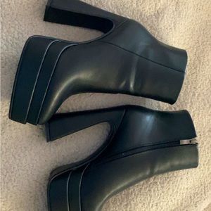 Chunky platform boots with pointed toe double platform. Heel height is 5.5